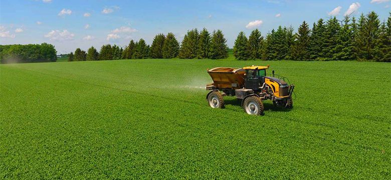 Holmes Agro equipment working on crop